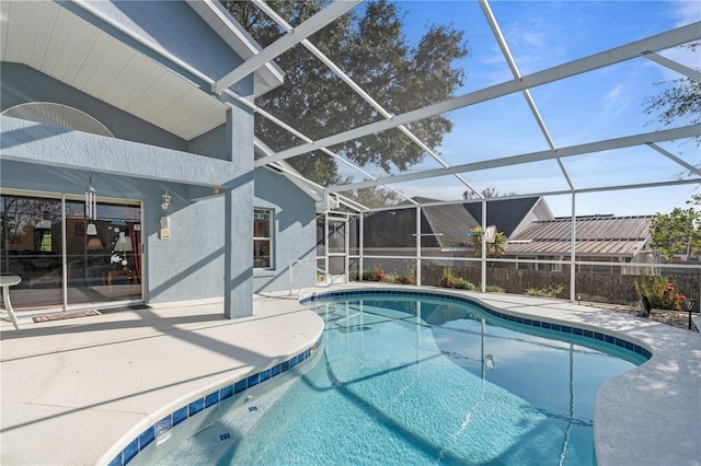 view of pool featuring a lanai and a patio