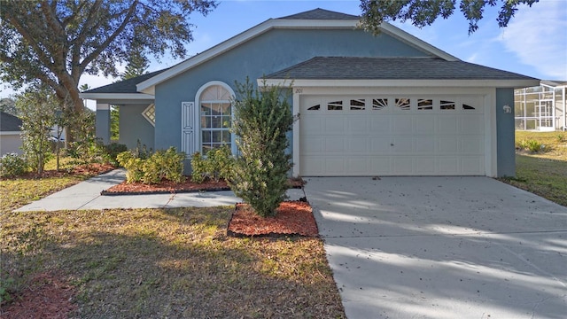 single story home featuring a garage