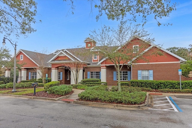 view of front of home with brick siding