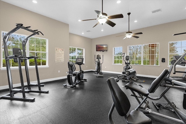 exercise room featuring recessed lighting, baseboards, and a wealth of natural light