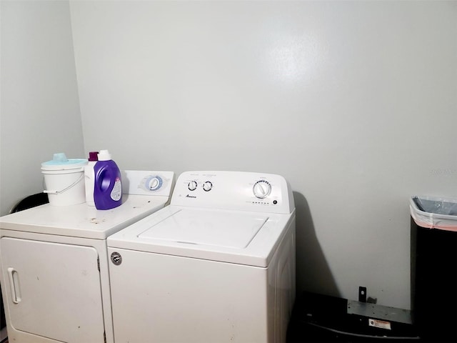 laundry room with independent washer and dryer