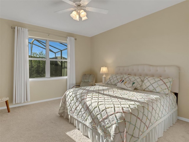 bedroom with light carpet and ceiling fan