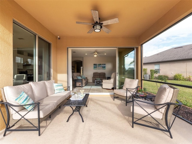 sunroom / solarium with ceiling fan