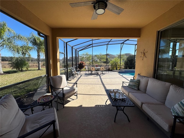 view of patio with ceiling fan, an outdoor hangout area, and a lanai