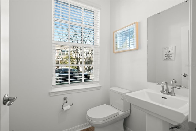 bathroom with toilet and sink