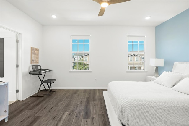 bedroom featuring ceiling fan and dark wood-type flooring