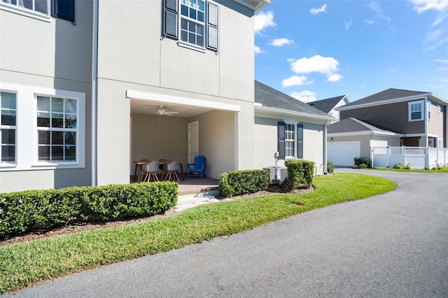 property entrance featuring central AC unit