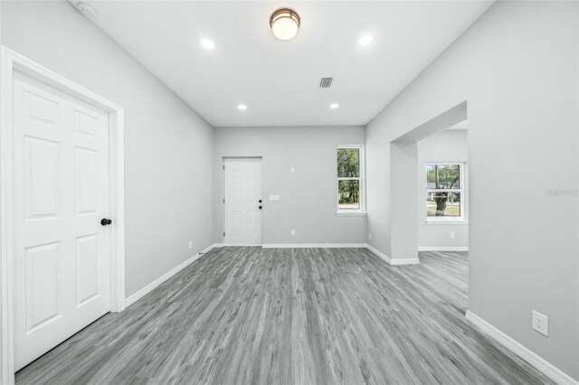 spare room featuring light hardwood / wood-style floors