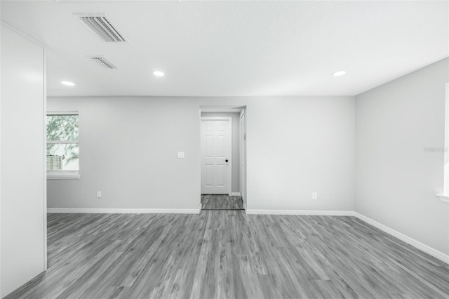 unfurnished room featuring light wood-type flooring