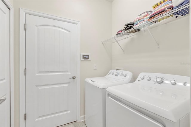 laundry area featuring independent washer and dryer