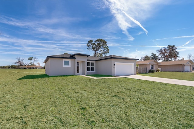 ranch-style house featuring driveway, stucco siding, an attached garage, and a front yard