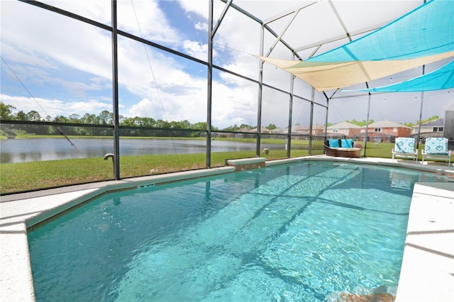 view of swimming pool with a water view