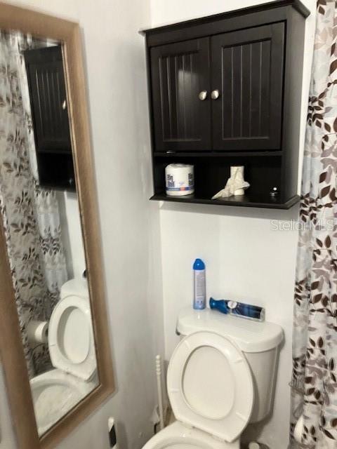 bathroom featuring toilet