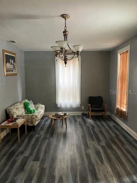 sitting room featuring dark hardwood / wood-style floors