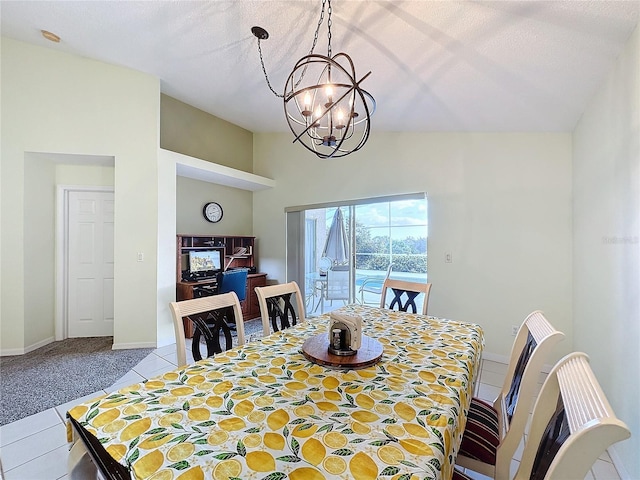 dining space with a textured ceiling, an inviting chandelier, and lofted ceiling