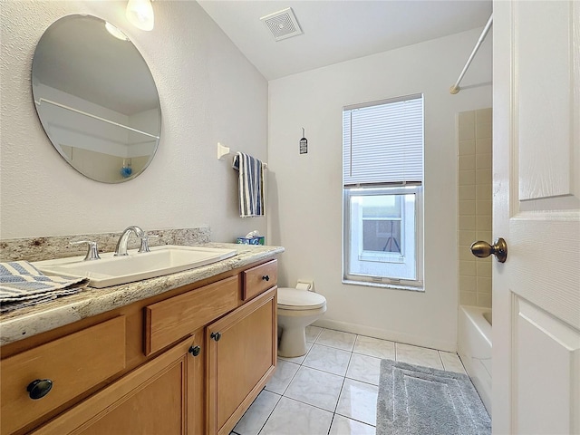 full bathroom with tile patterned floors, vanity, toilet, and washtub / shower combination