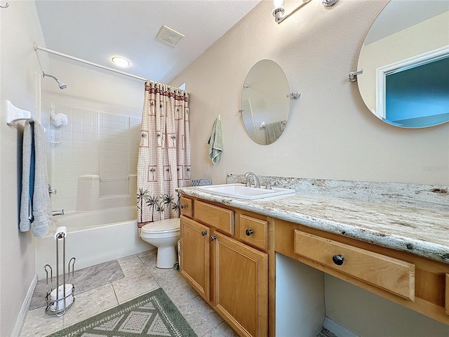 full bathroom featuring shower / bath combo, toilet, and vanity