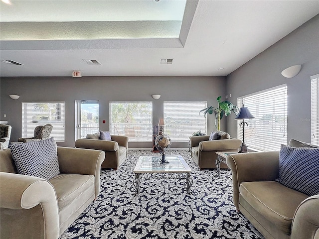 living room featuring light carpet