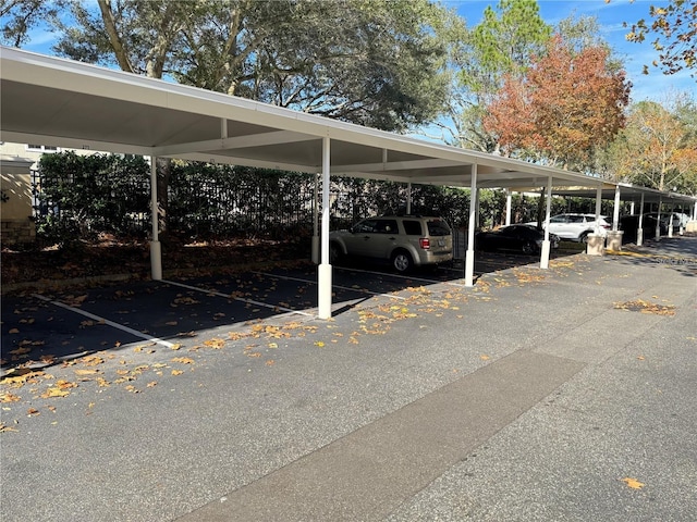 view of parking featuring a carport