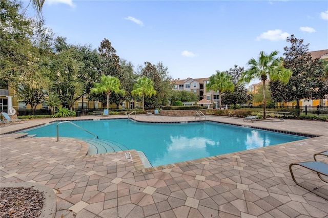 view of pool with a patio area