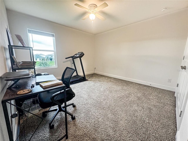 carpeted home office with ceiling fan