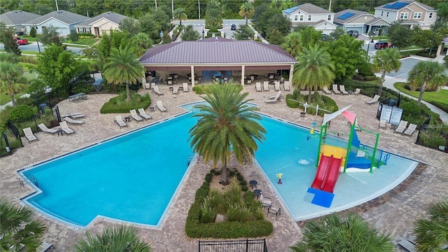 view of swimming pool with a patio