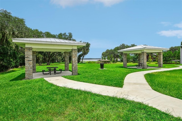 view of community featuring a yard and a gazebo