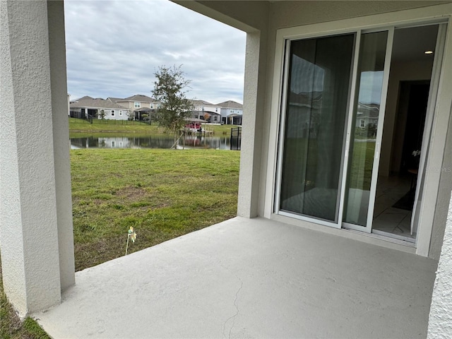 view of patio / terrace featuring a water view