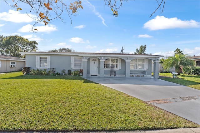 ranch-style home with covered porch and a front lawn