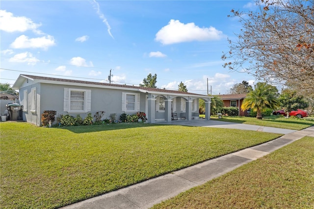 ranch-style house featuring a front yard