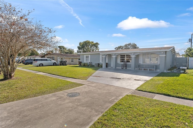 ranch-style house featuring a front yard