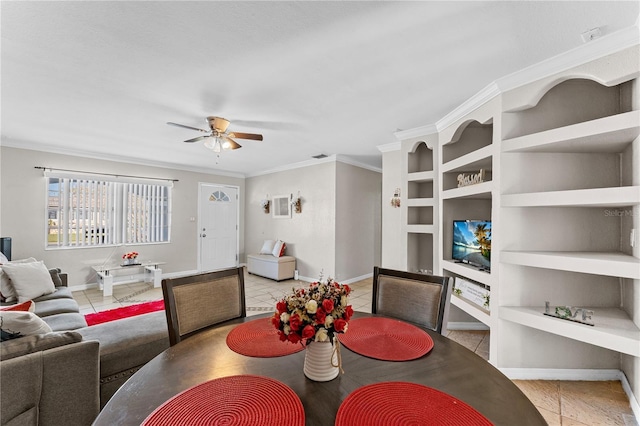 dining area with light tile patterned floors, built in features, ceiling fan, and crown molding