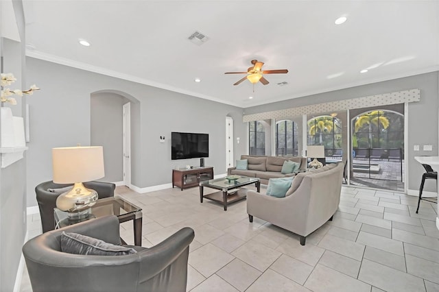 tiled living room with ceiling fan and ornamental molding