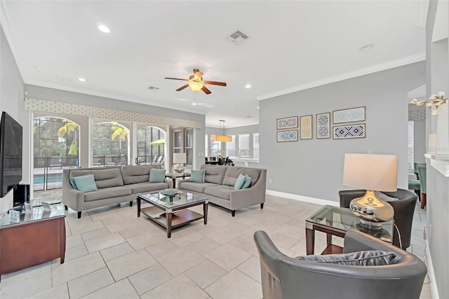 living room with light tile patterned floors, ornamental molding, and ceiling fan