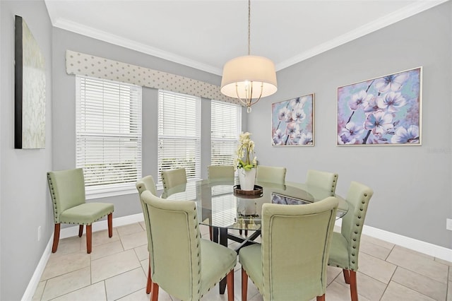 tiled dining area with a wealth of natural light and ornamental molding