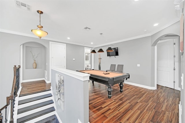 playroom with dark wood-type flooring, pool table, and ornamental molding