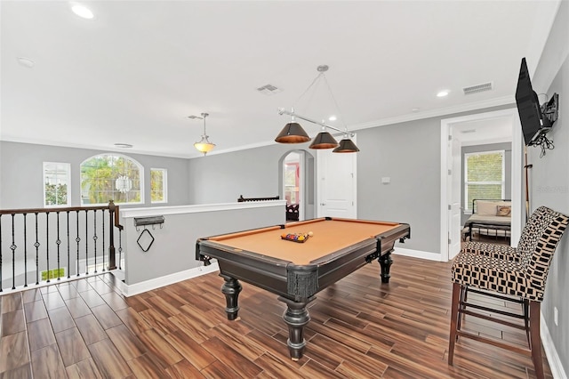 recreation room with plenty of natural light, ornamental molding, and hardwood / wood-style floors