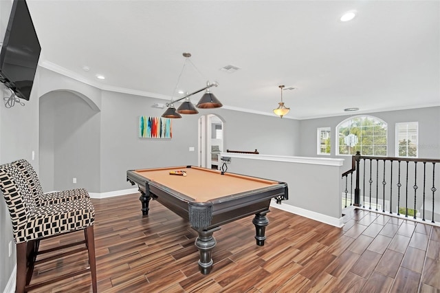 game room with pool table and crown molding