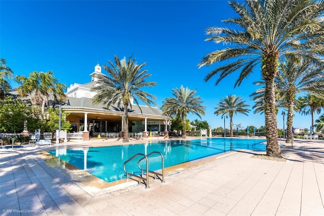 view of pool featuring a patio area