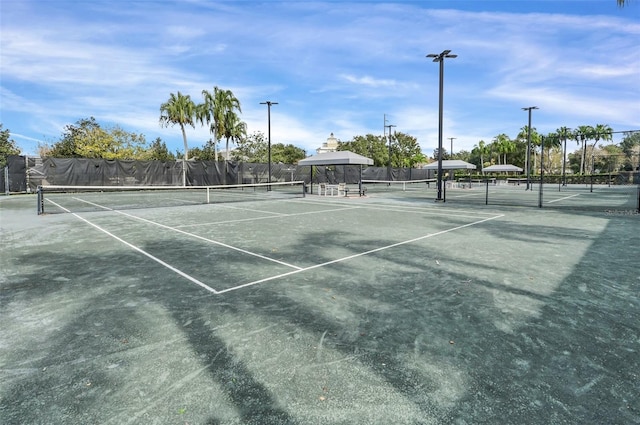 view of sport court with a gazebo