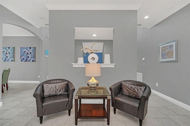 sitting room with light tile patterned floors