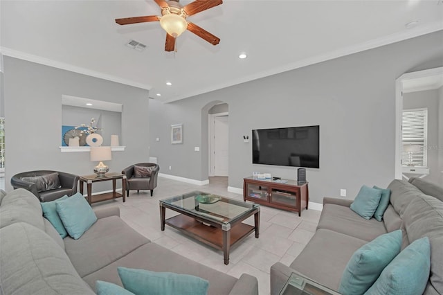 living room featuring crown molding, ceiling fan, and light tile patterned flooring