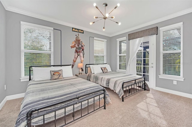 bedroom featuring multiple windows, access to outside, and a notable chandelier