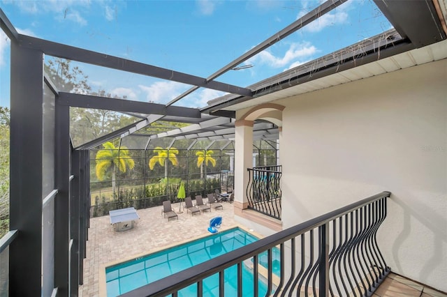 view of pool featuring a patio and a lanai