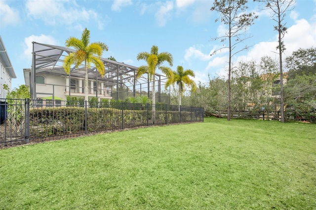 view of yard featuring a lanai