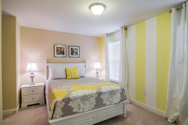 bedroom featuring carpet flooring