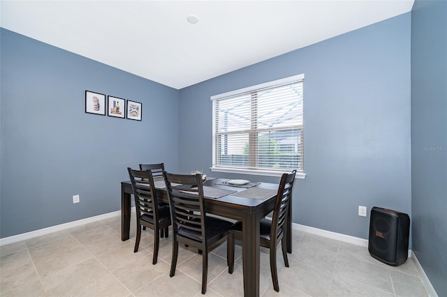 dining room featuring light tile patterned floors