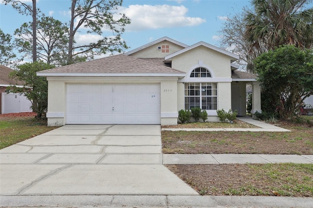 view of front of property featuring a garage