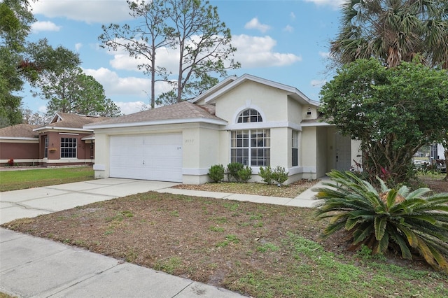 ranch-style house featuring a garage