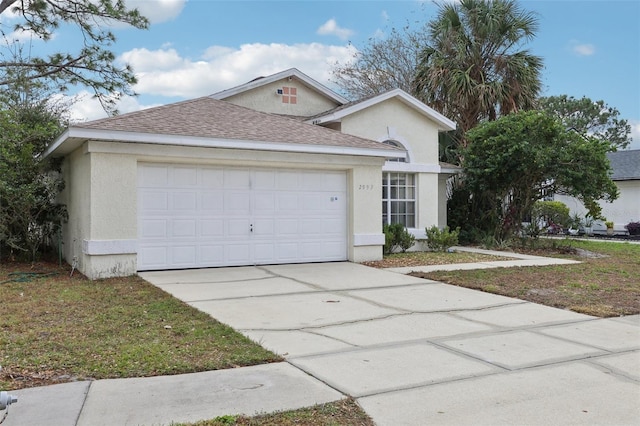 ranch-style house featuring a garage